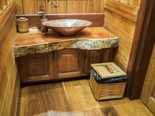 Vintage,Brass,Wash,Basin,And,Faucet,In,Wooden,Bathroom.