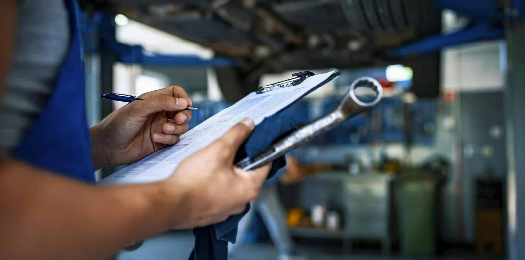 Check the Owner's Manual and Inspect the Brake Pads