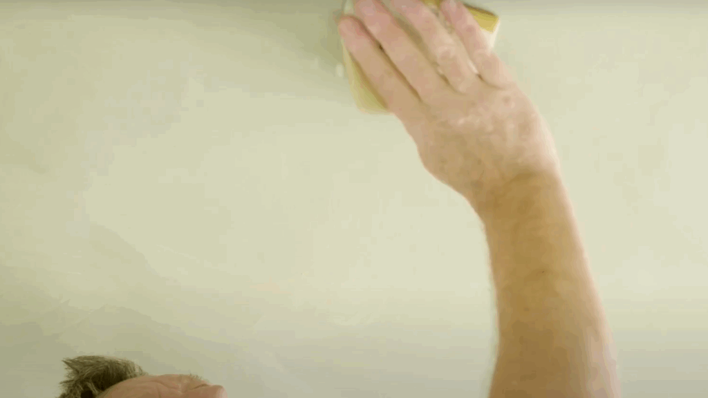 Sand the Surface and Clean the Ceiling In-Between Coats