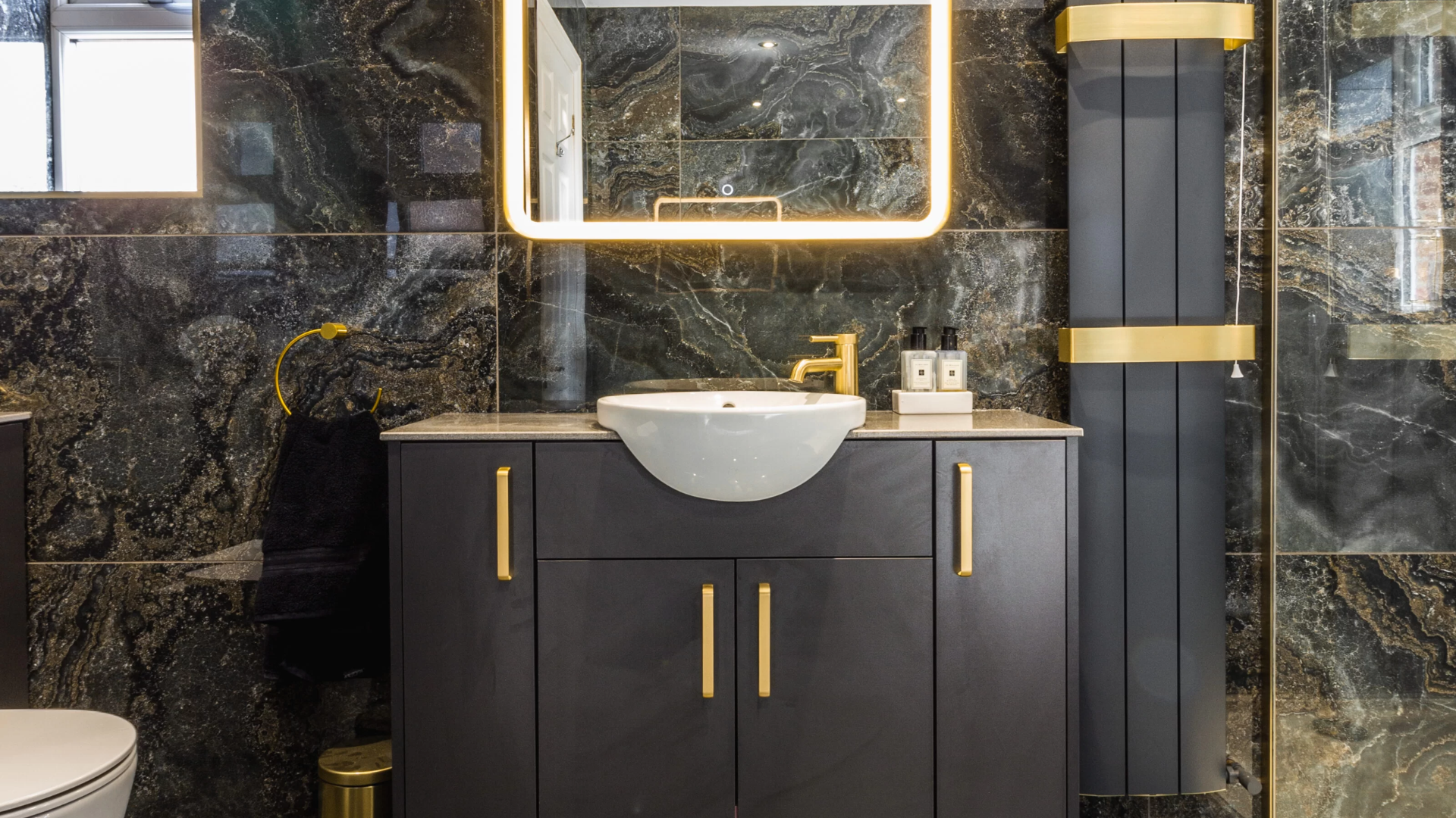 Black Tiles with Brass Fixtures