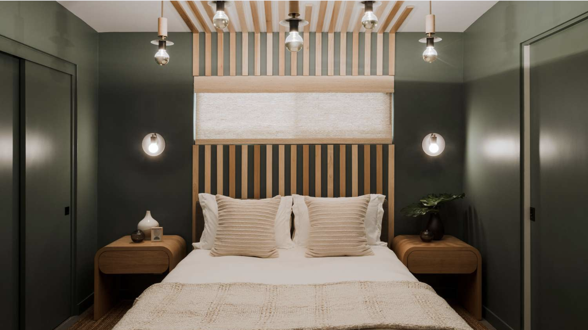 Dark Green Accent Wall with Minimalist Decor