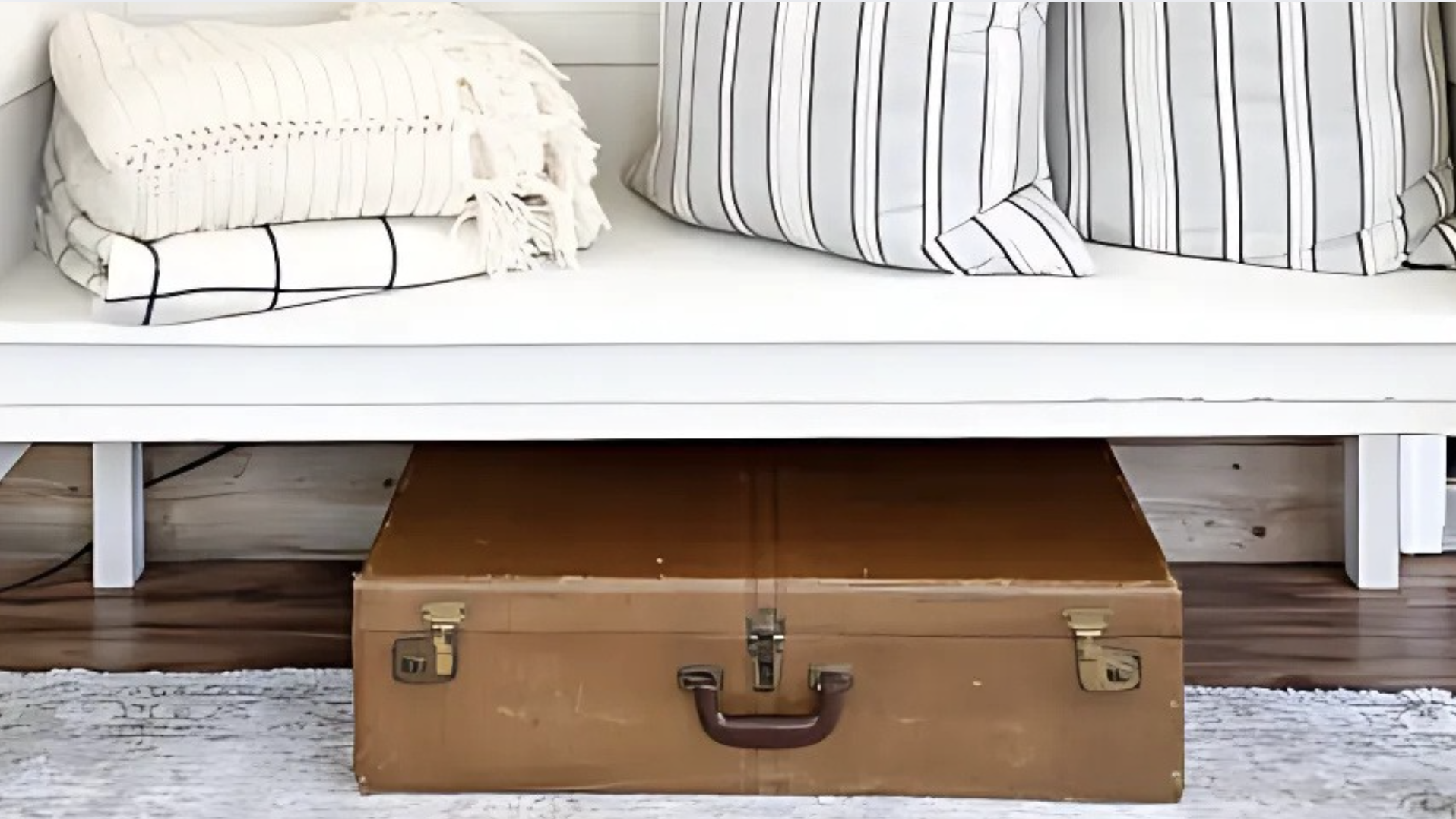 Repurposed Trunk as Footboard Bench