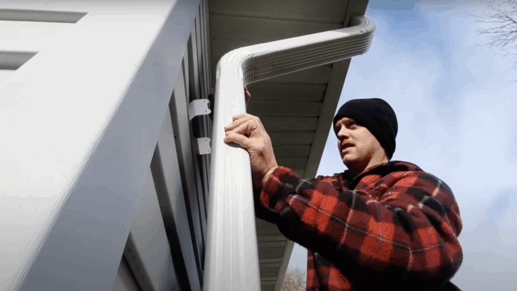 Step_4_Secure_the_Downspout_to_the_Wall