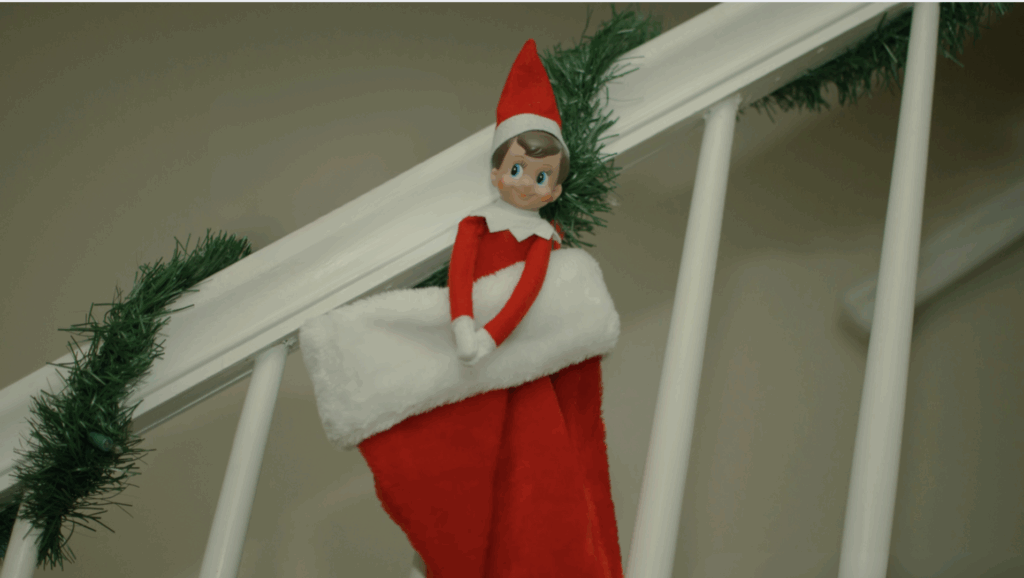 Elf Hidden Inside a Christmas Stocking