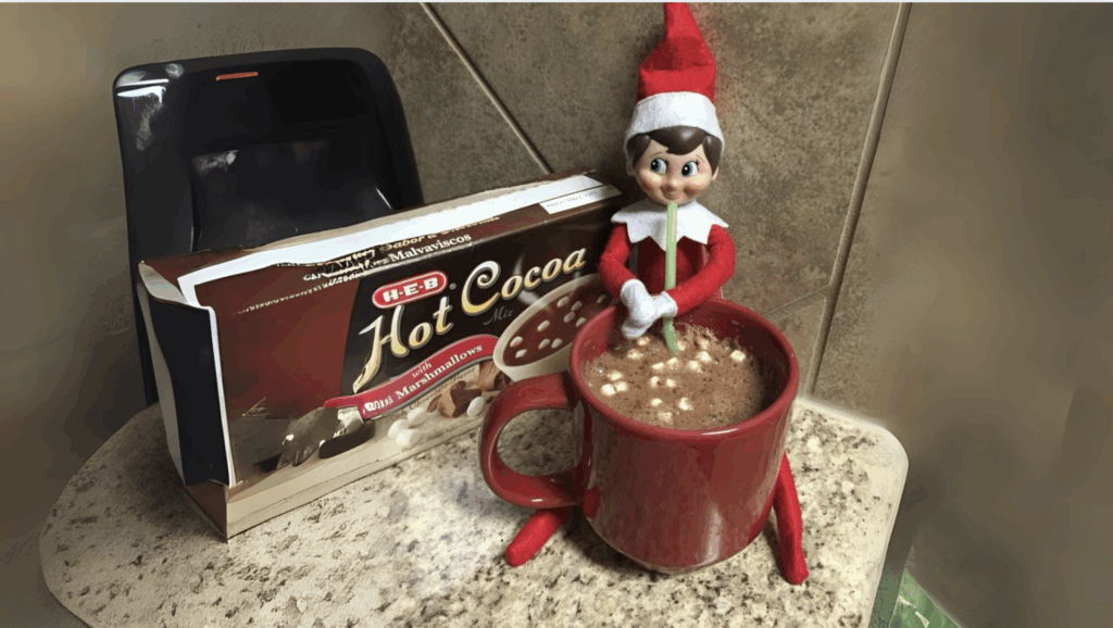 Elf Sipping Hot Chocolate from a Tiny Cup