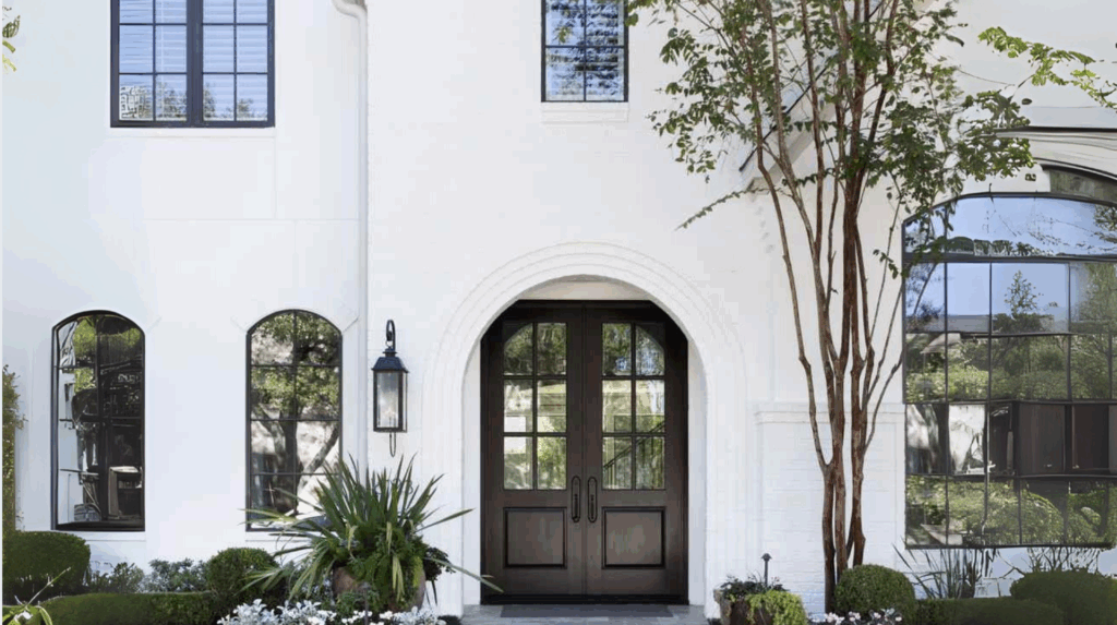 White Courtyard Walls with a Black Gate
