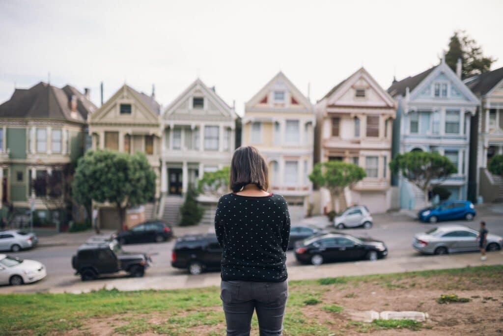 A resident in front of their home, wondering about the history of my house.