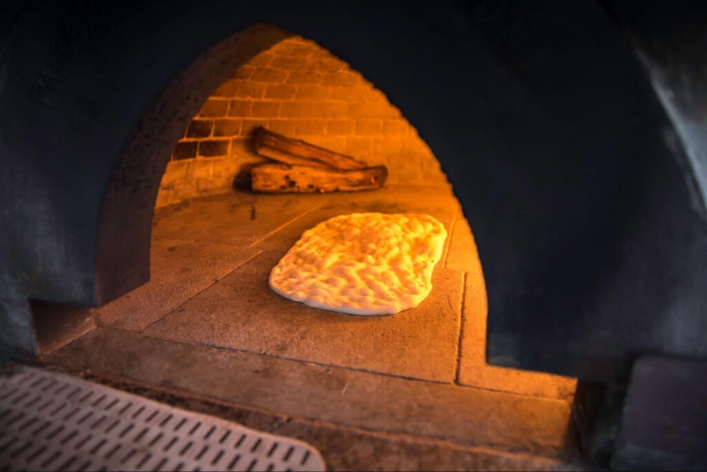 How Fire Bricks Improve Heat Retention in Pizza Ovens