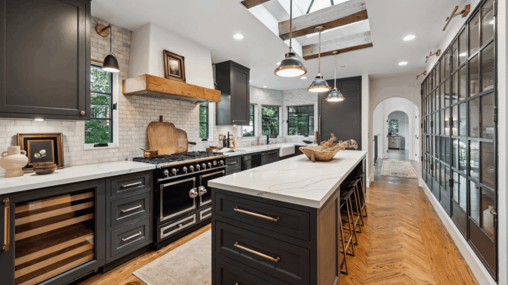 1. Matte Black Cabinets with Warm Wood Accents
