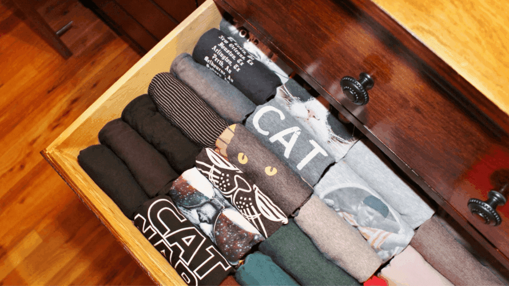 11. Roll Small Items to Save Space