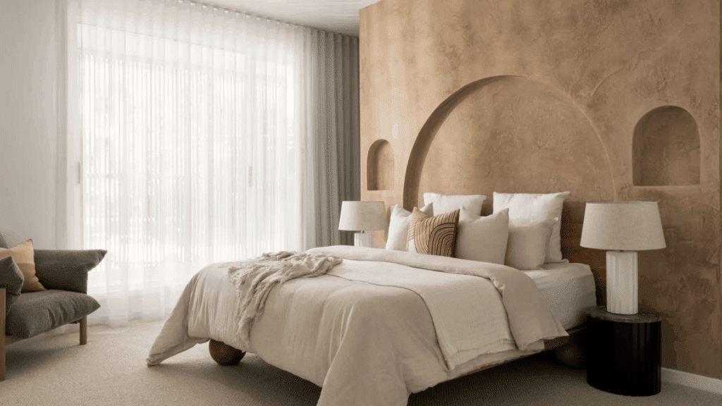 bedroom with sheer white curtains