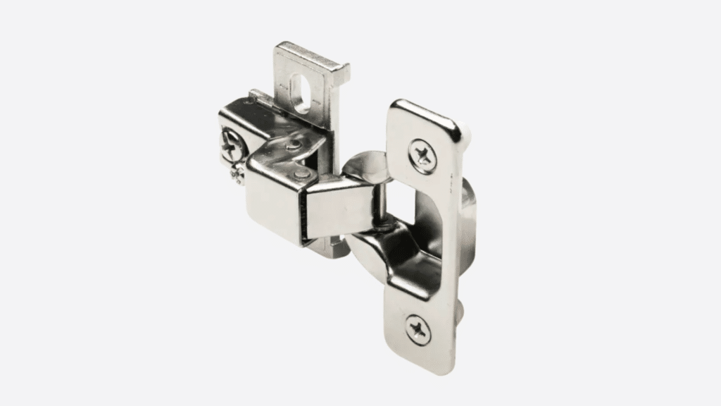 A close-up, high-angle shot shows a Self-Closing Hinge against a plain white background
