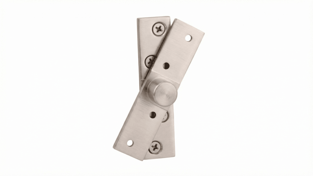 A close-up, high-angle shot shows a stainless steel pivot hinge against a white background.