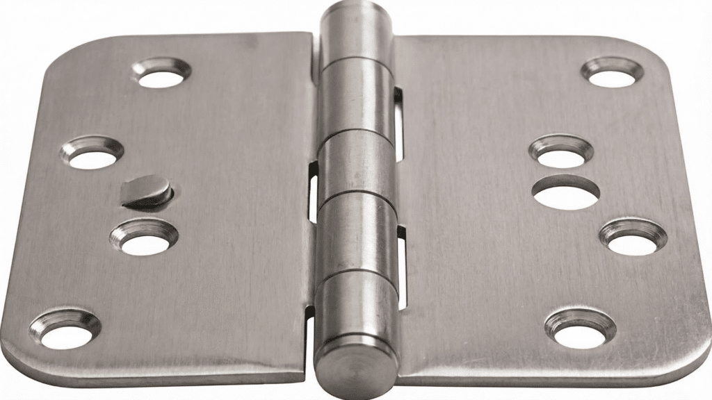 A close-up, top-down studio shot shows a security hinge against a white background