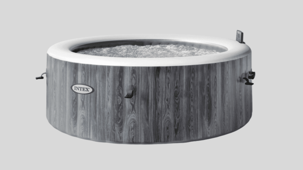 An Intex PureSpa Plus Greywood Deluxehot tub against a light grey background.