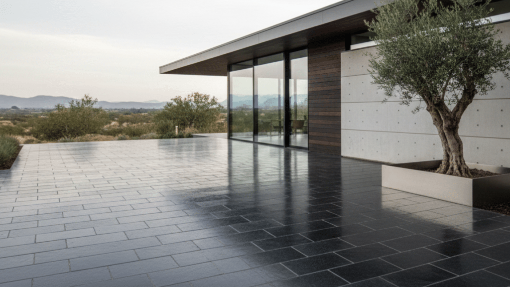 Basalt stone driveway in front of a modern home