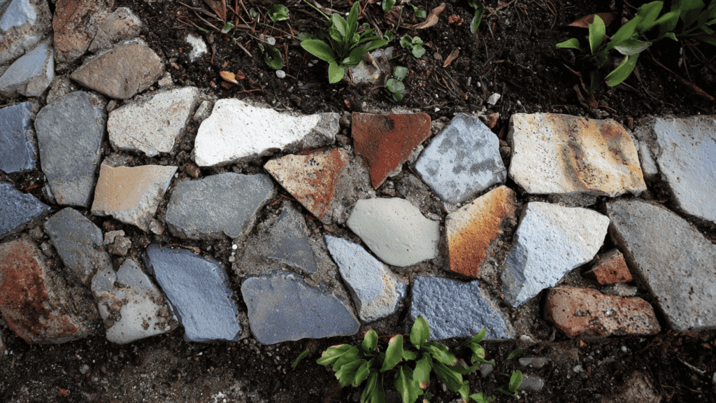 Broken stone mosaic used as creative garden edging