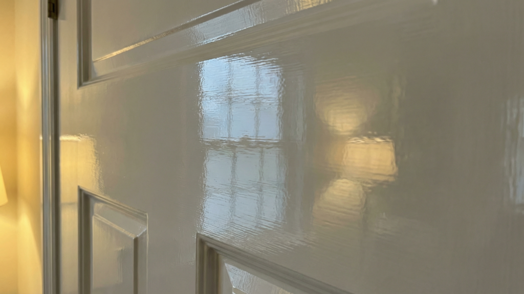 Close-up of semi-gloss paint finish showing noticeable shine and light reflection