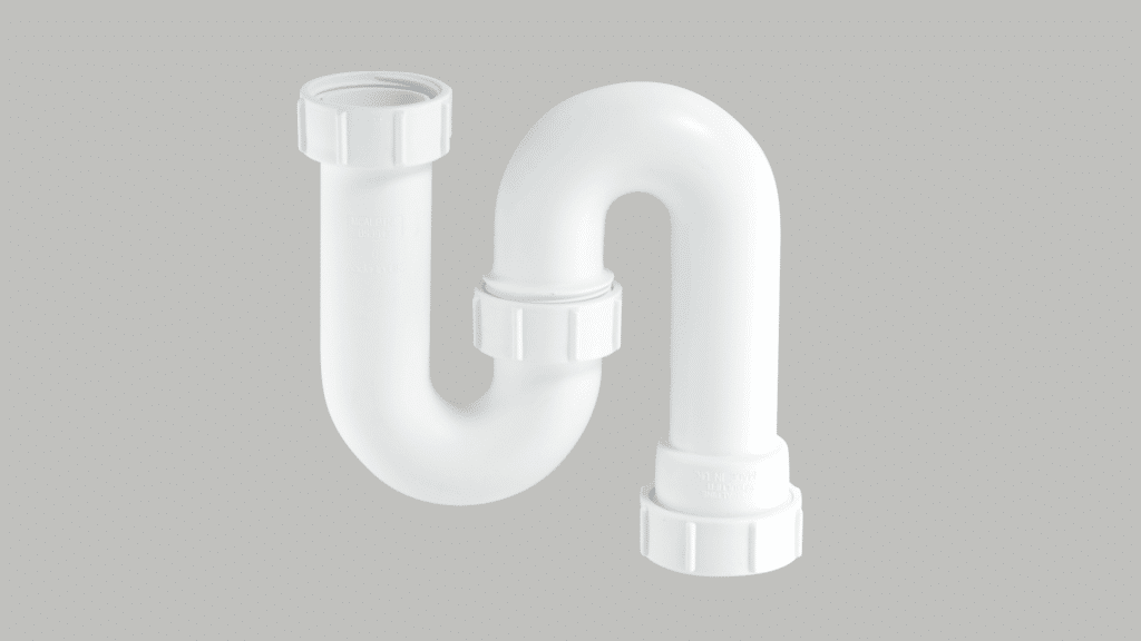 White plastic S-trap plumbing fixture with threaded compression fittings on a light gray background