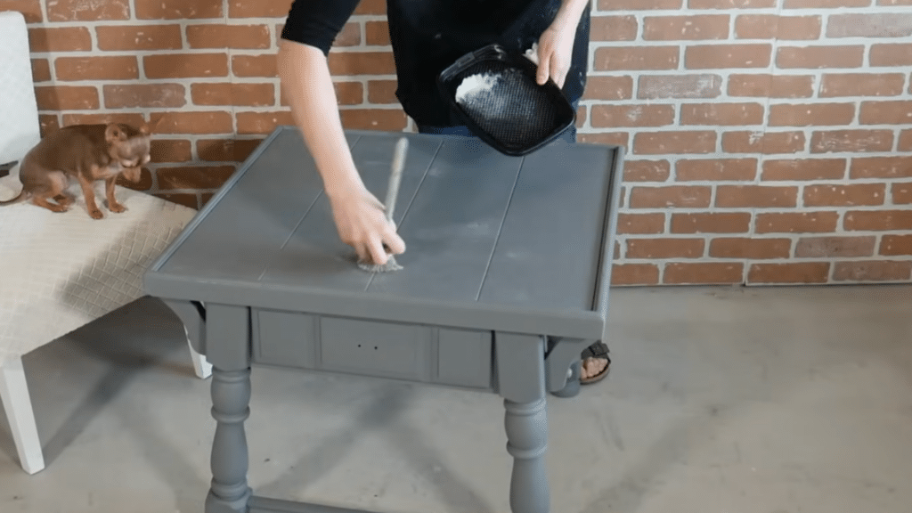 Buffing excess wax from chalk-painted surface