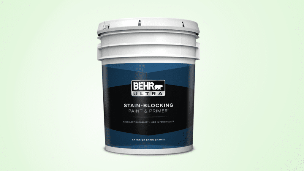 Can of Behr Premium Plus Ultra Exterior on a light green solid background