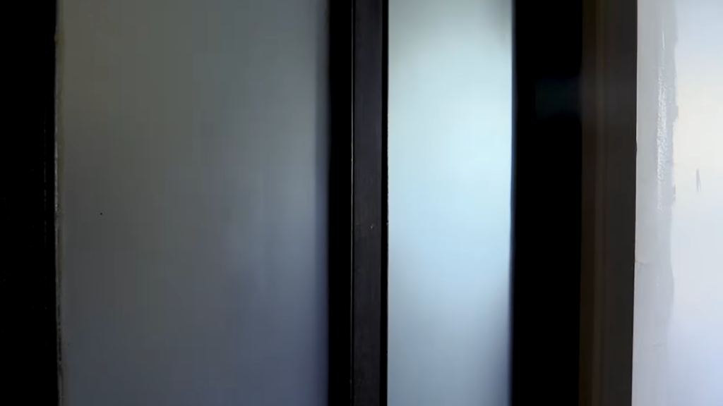 Finished frosted glass door panel with smooth matte privacy finish