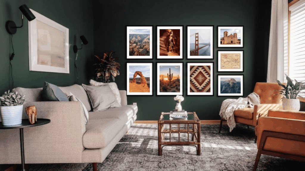 a living room with green accent wall framed pictures on the wall modern furniture and lighting creating an inviting space
