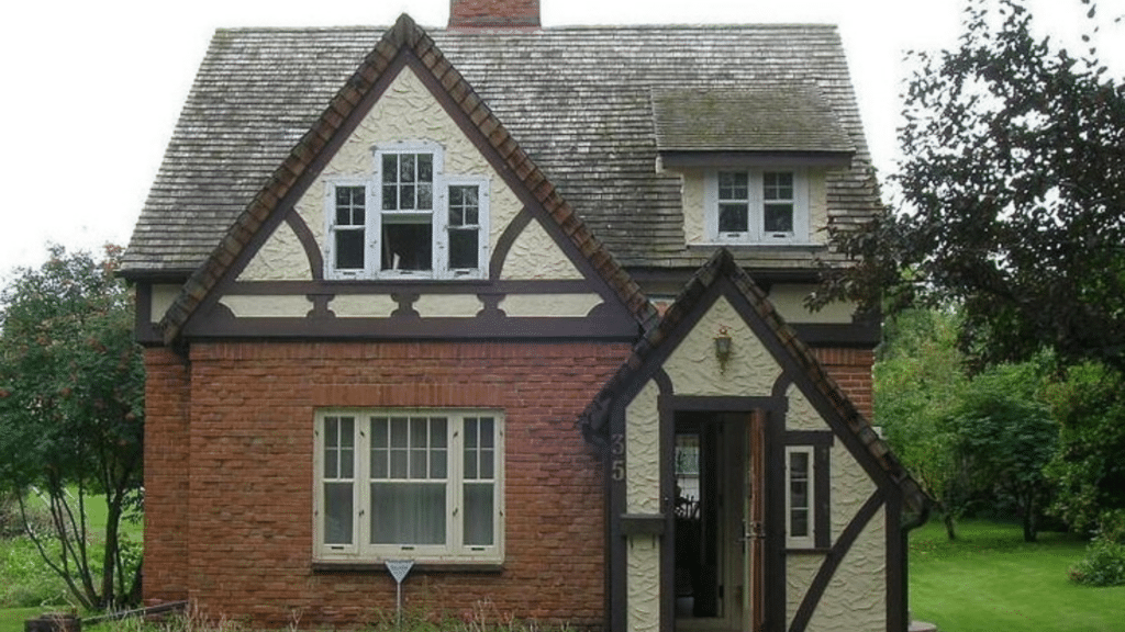 classic small tudor cottage with brick walls and timber beams