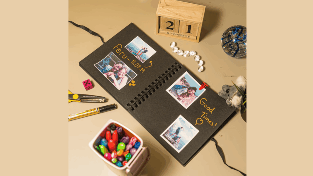 diy valentine memory scrapbook with photos markers and decorations on craft table