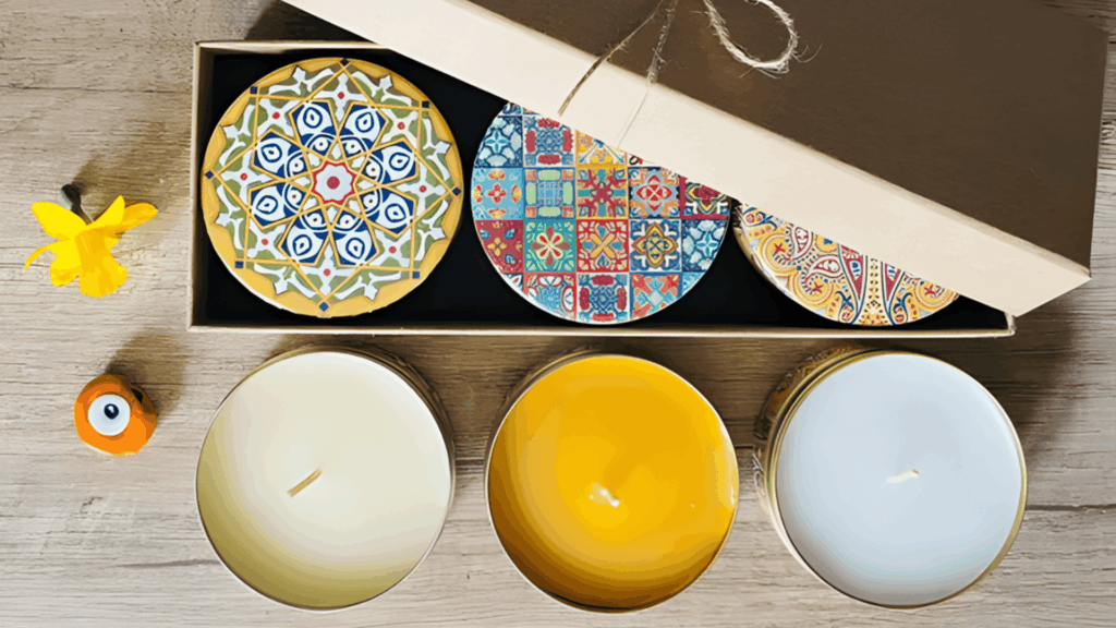 gift box with decorative tin candles and lids arranged on wooden table for homemade gifts made easy