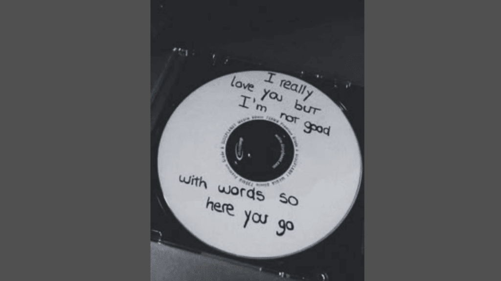 handwritten message on cd that says i really love you but i’m not good with words so here you go