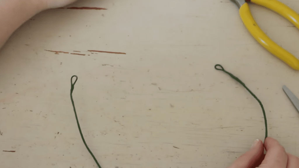 how to make a flower crown by wrapping wire with floral tape to secure the base