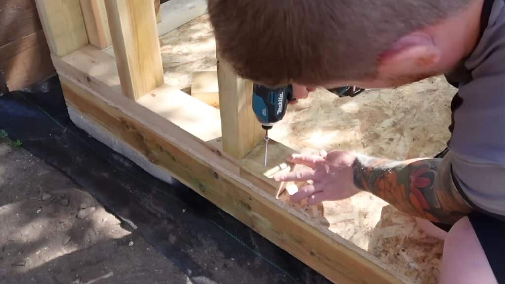 installing noggins between studs to improve strength and make the shed frame durable
