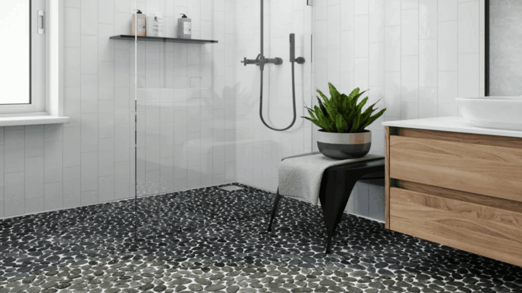 japanese bathroom design with glass walk in shower pebble stone floor wooden vanity and clean minimal spa style interior