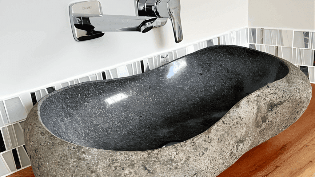 japanese bathroom design with stone vessel sink wooden vanity wall mounted faucet and natural spa style interior