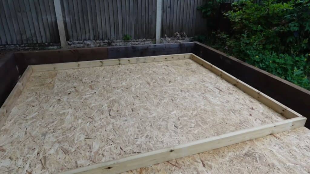 laying out and aligning the full wall frame on ground to ensure proper shape and fit