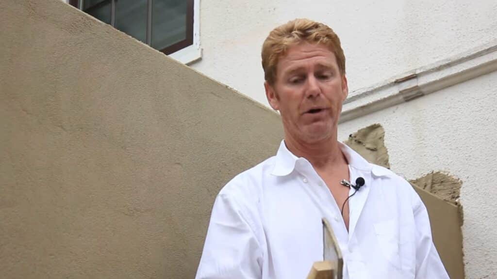 installing wire lath on soffit to prepare surface for stucco dash finish