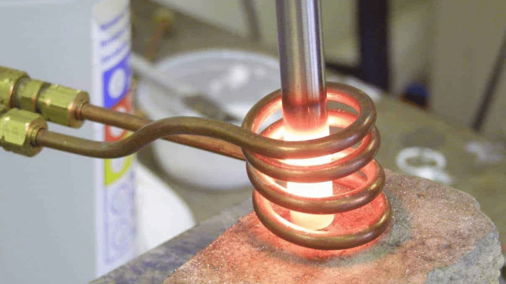 metal being heated with an induction coil
