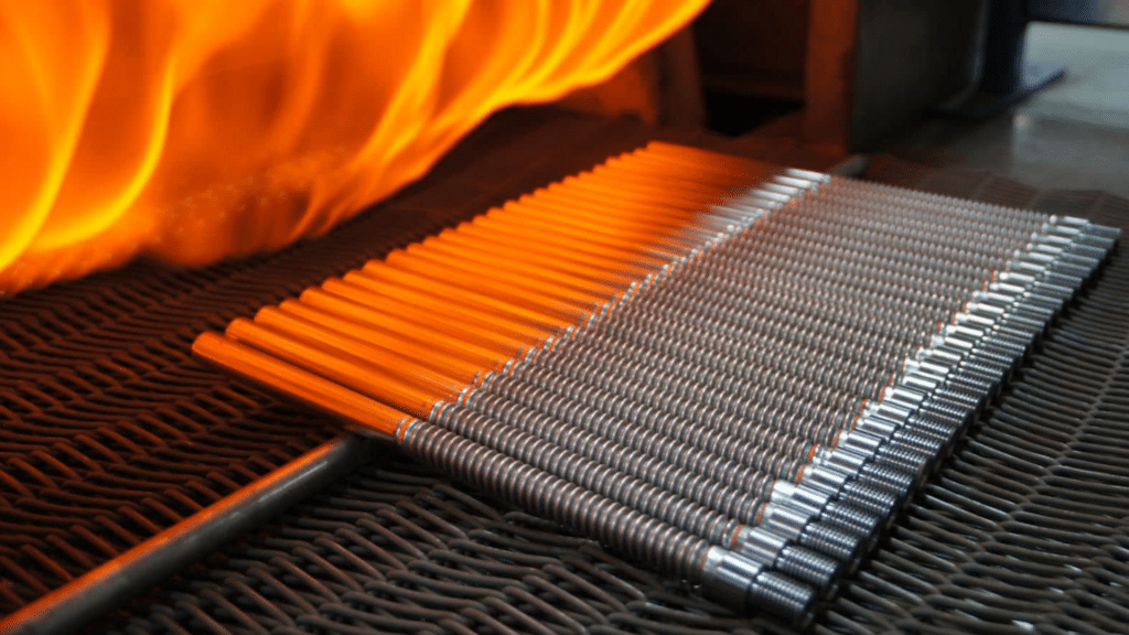 metal rods being heated in flames