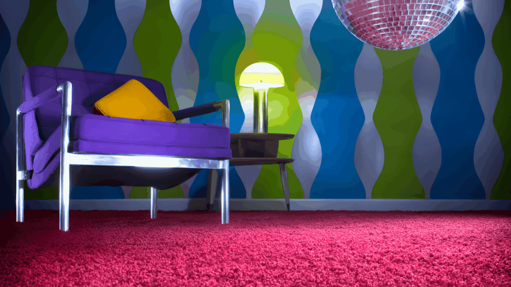 nostalgic 70s home interior ideas youll adore with bold colorful wall patterns purple lounge chair glowing lamp and shag carpet evoking playful retro style