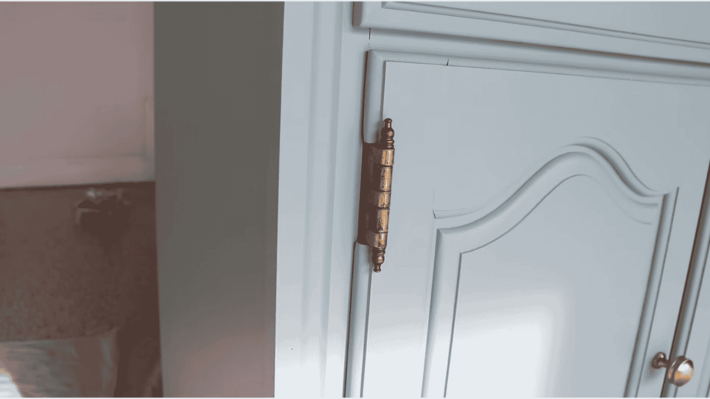 painted furniture cabinet door with new hardware after completing how to paint furniture project