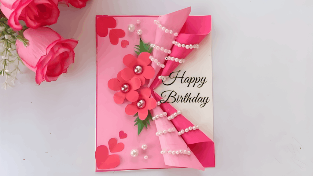 pink handmade birthday card with paper flowers pearls and hearts decoration for homemade gifts made easy