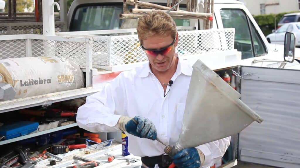 preparing hopper gun nozzle for spraying stucco dash finish texture