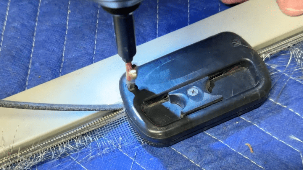 remove the handle using screwdriver and clear the frame edges to prepare surface for new screen installation