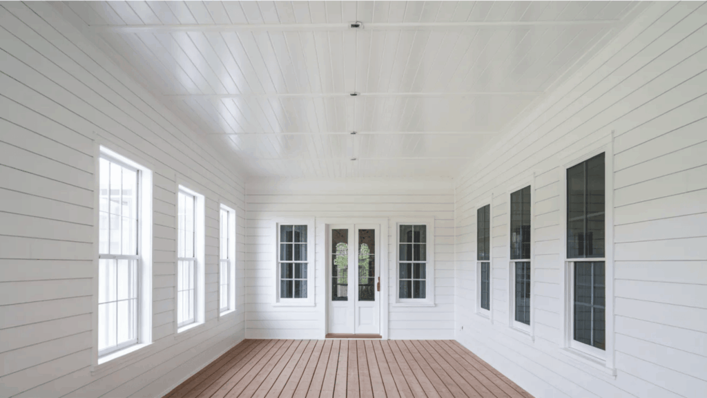 white shiplap ceiling with large windows on the porch porch ceiling ideas