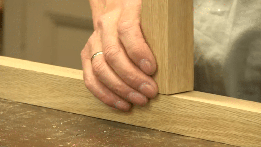 adjusting the tenon thickness to ensure a precise fit for the mortise and tenon