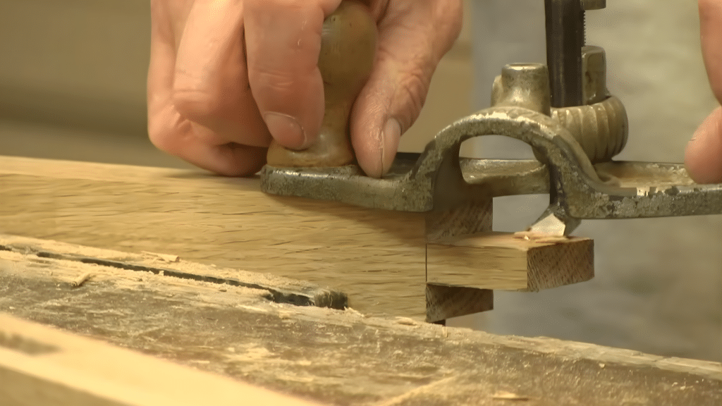 applying pressure to the joint to ensure a tight and secure fit between the mortise and tenon
