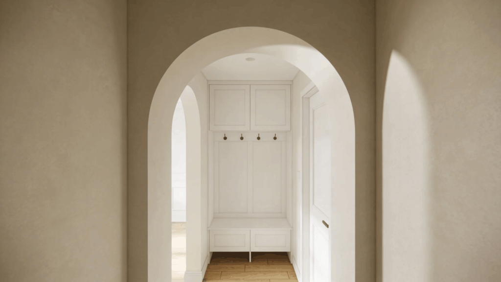 arched hallway leading to built in bench and hooks creating minimal bright and elegant entry space