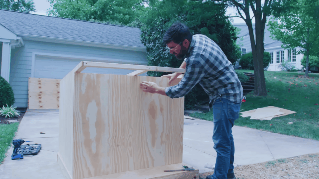 attaching plywood panel to dog house side wall