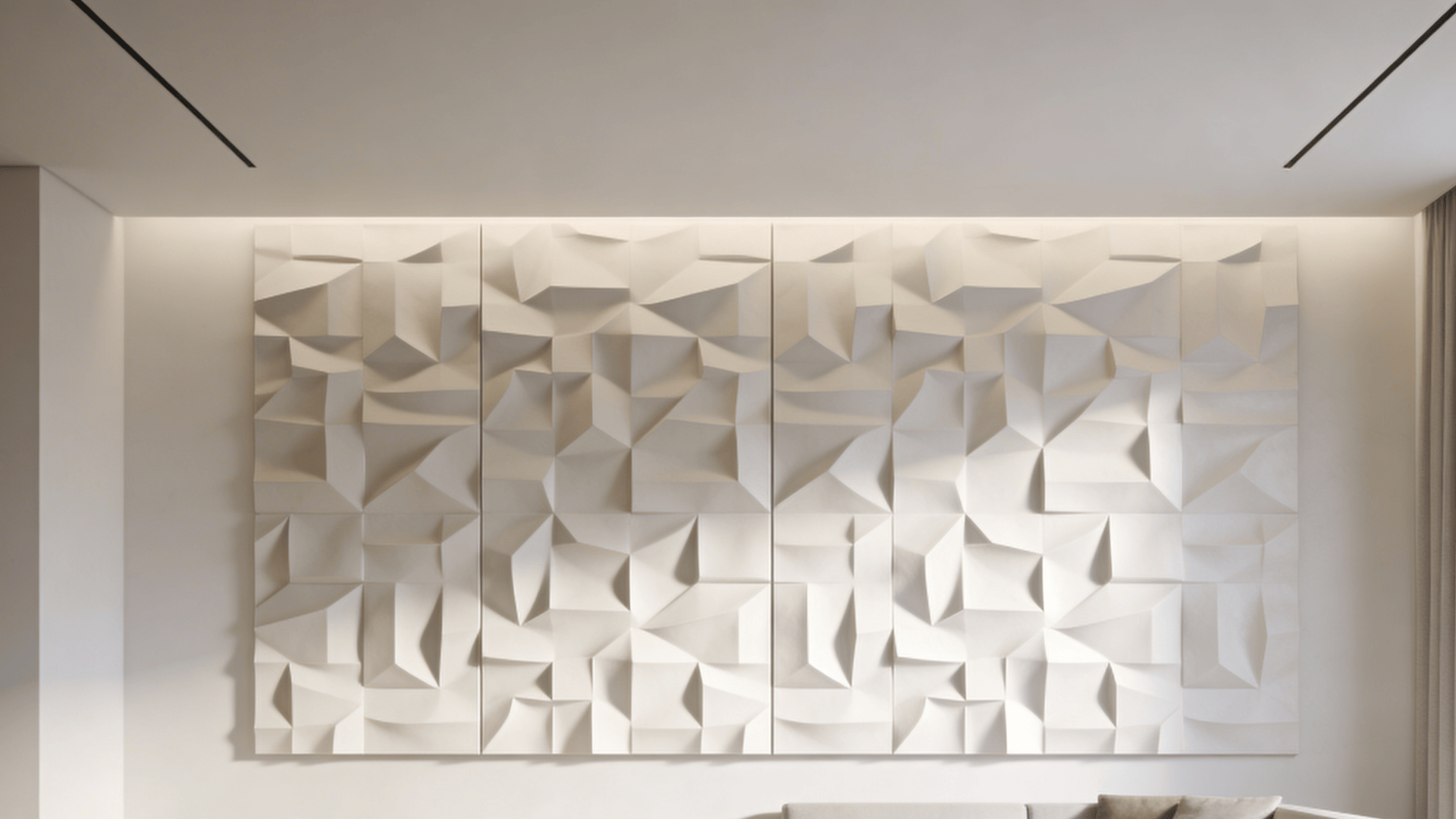 close up of white geometric wall panels with angular folded shapes creating modern textured surface pattern